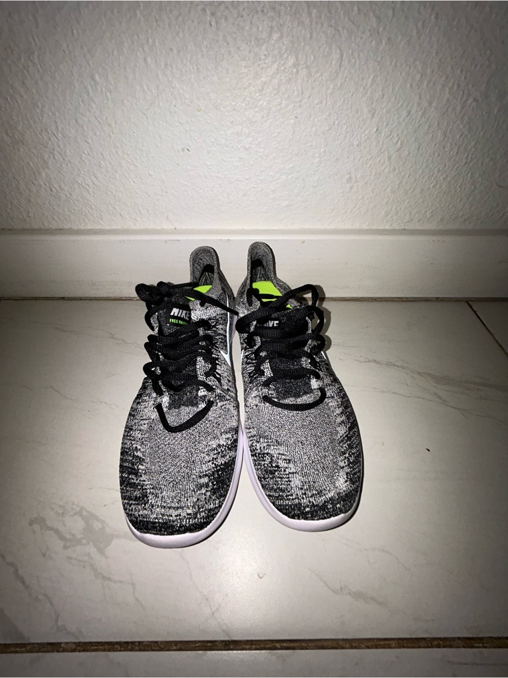 Nike women’s Black & Gray Knit Athletic Sneakers with Neon Green Accent